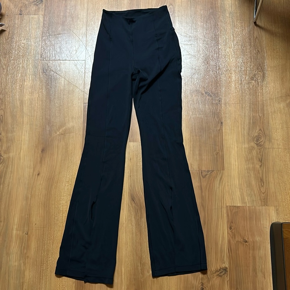 gently worn - Lululemon leggings with slit at bottom, size 4 tall